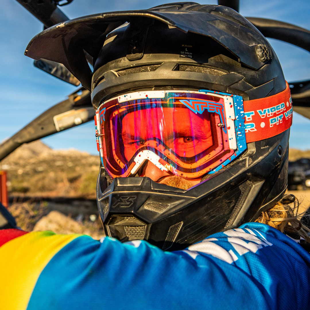 / Climax | Man wearing the Brapstrap with a climax lens by Pit Viper Sunglasses