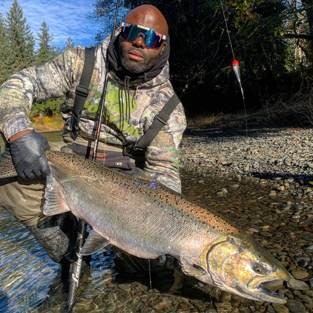 Wide / Polarized Blue | Man holding a big fish The Merika Original from Pit Viper Sunglasses