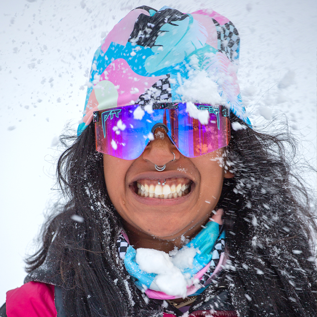 / Z87+ Climax | Woman smiling in the snow wearing Pit Viper Sunglasses