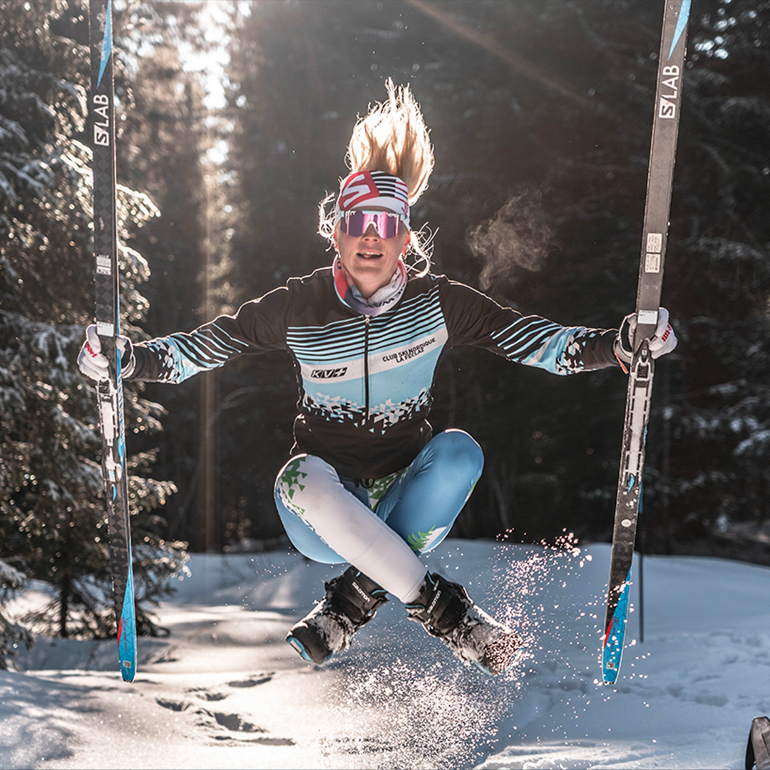 Narrow / Polarized Pink | Woman jumping with skis wearing The Gobby Original from Pit Viper Sunglasses