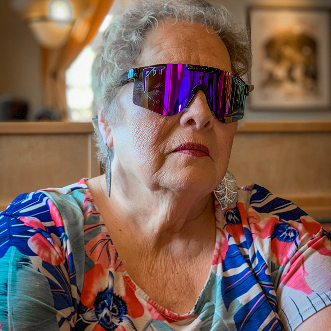 Wide / Polarized Purple | Woman wearing The Midnight Original from Pit Viper Sunglasses