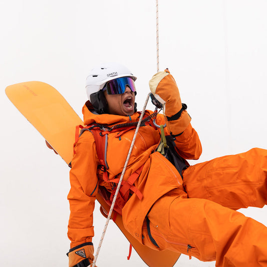/ Blue-Purple | Person repelling with a snowboard wearing The Mangrove Synthesizer from Pit Viper Sunglasses